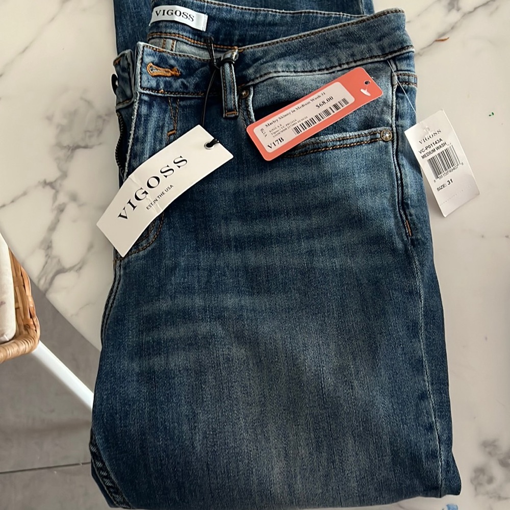 Never worn tags on super cute jeans VIGOSS